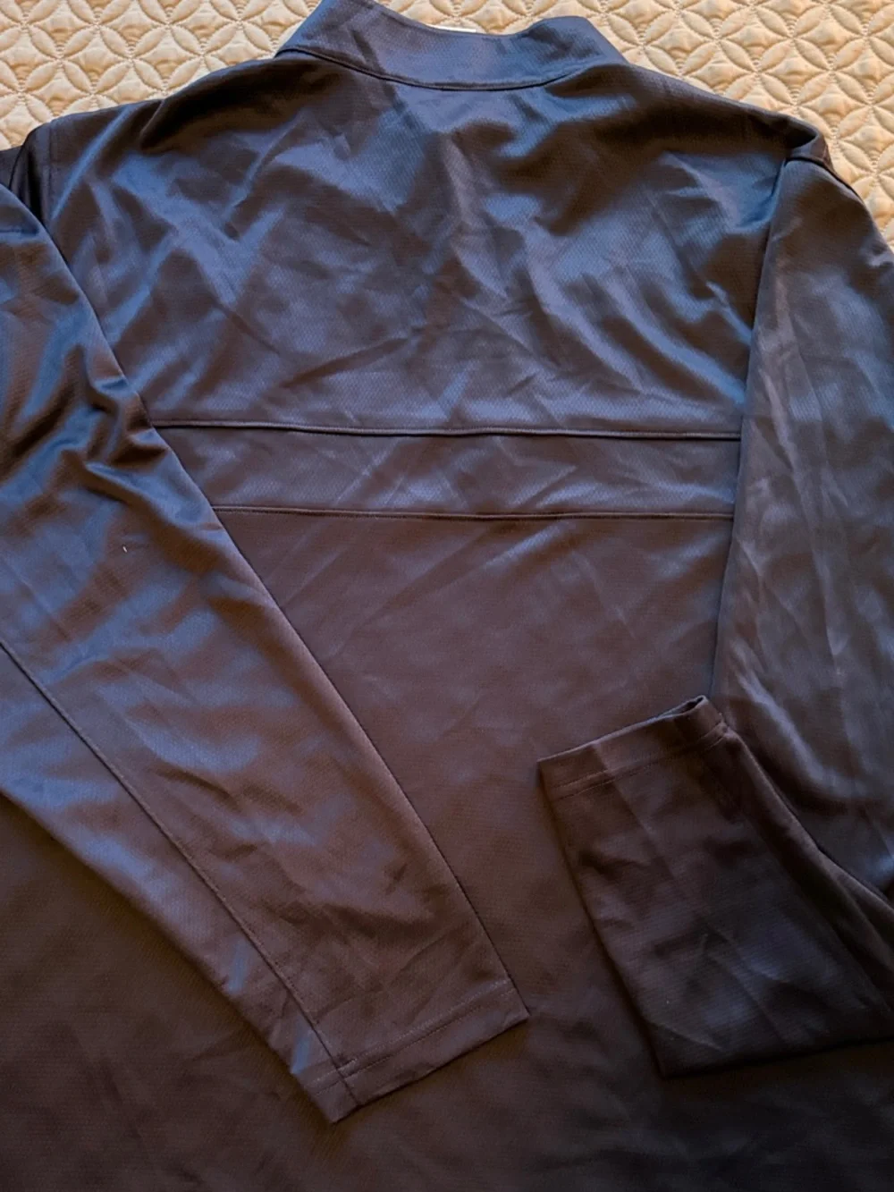 Nike Black Half-Zip Performance Pullover with White Swoosh